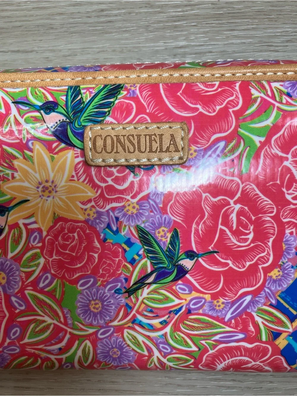 Consuela Pink Floral Embossed Zip Wristlet with Tan Strap